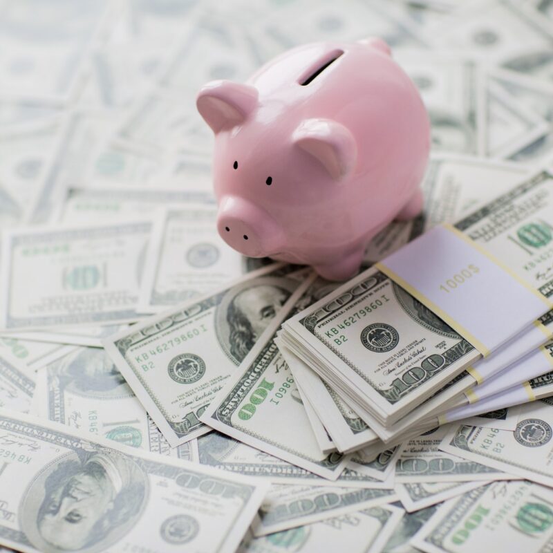 piggy bank on money